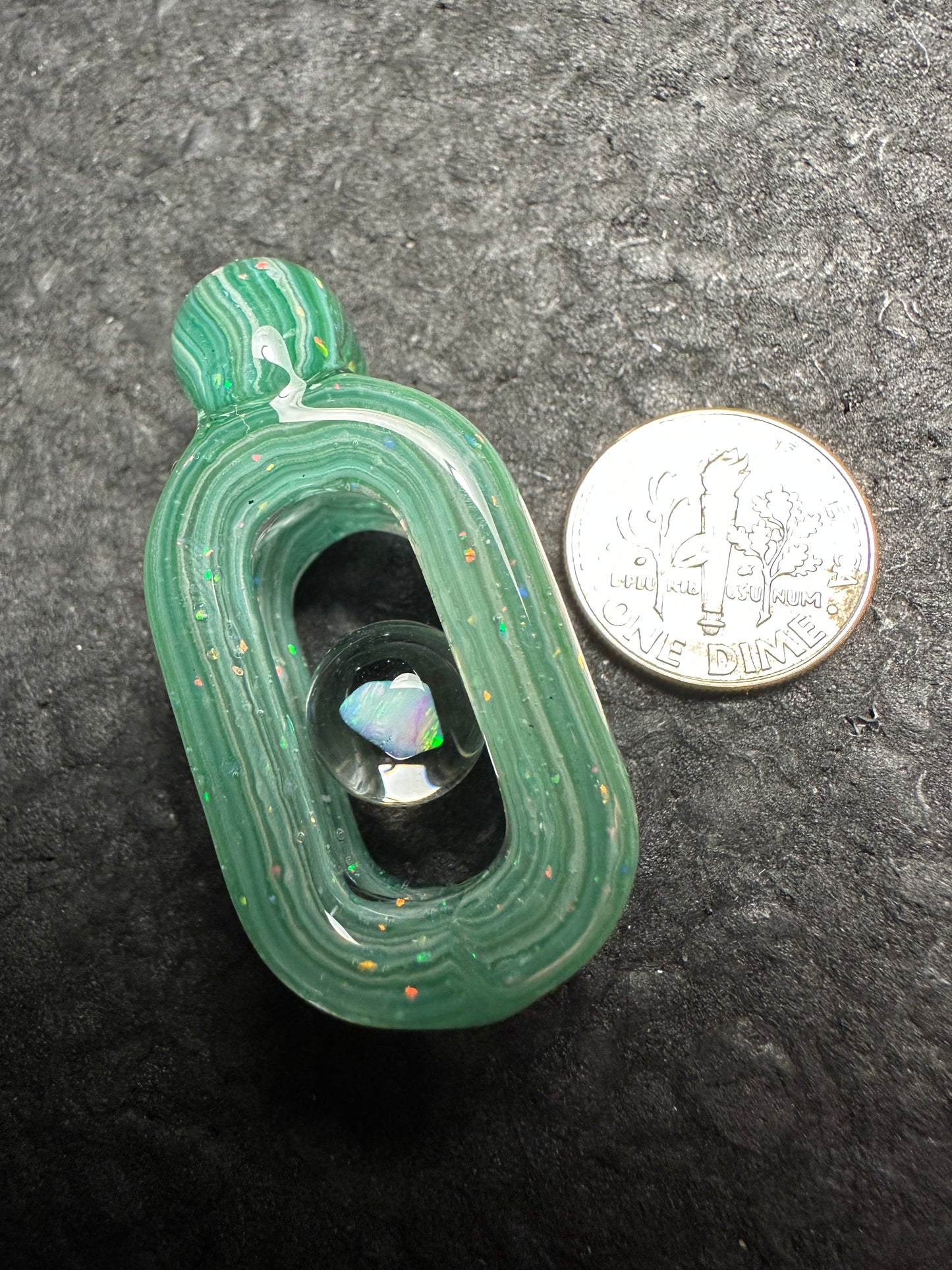 Ópalo triturado sobre mezcla verde Doublink™